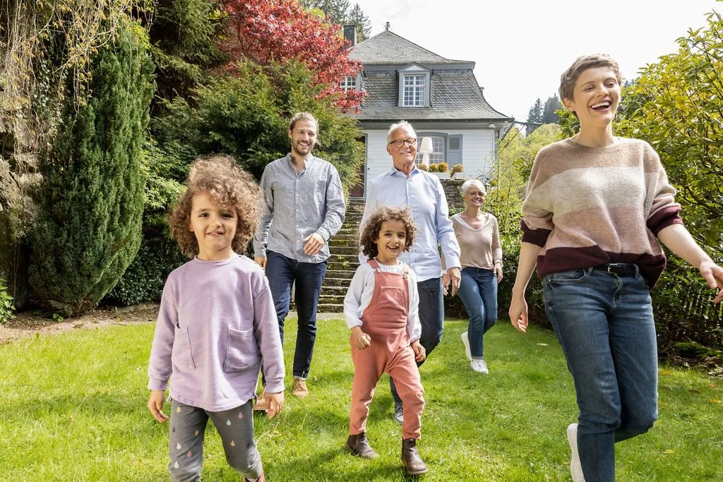 A family walking through a garden together