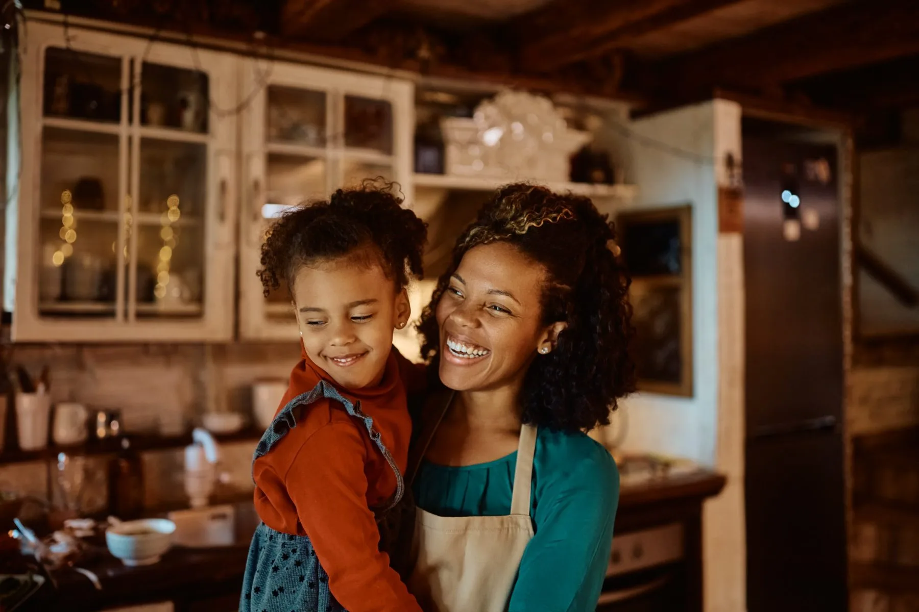 A mother and child in the kitchen together